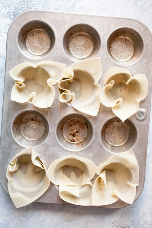 Wonton Cups crispy in the muffin tin.