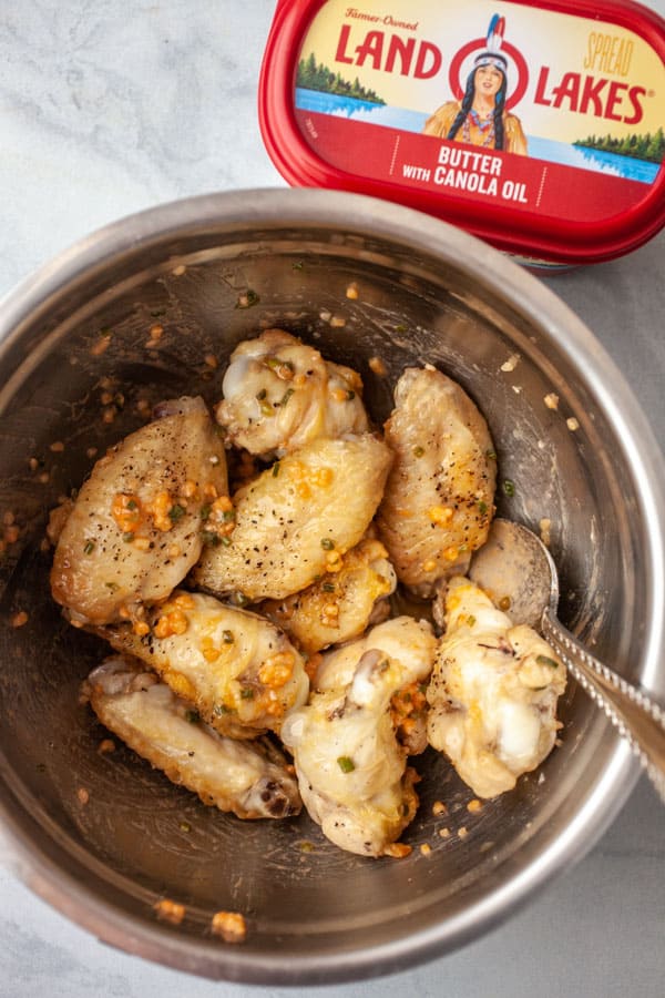 Tossing wings - Garlic Butter Chicken Wings