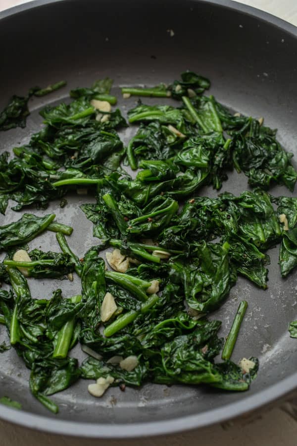 Fresh spinach sauteed with garlic.