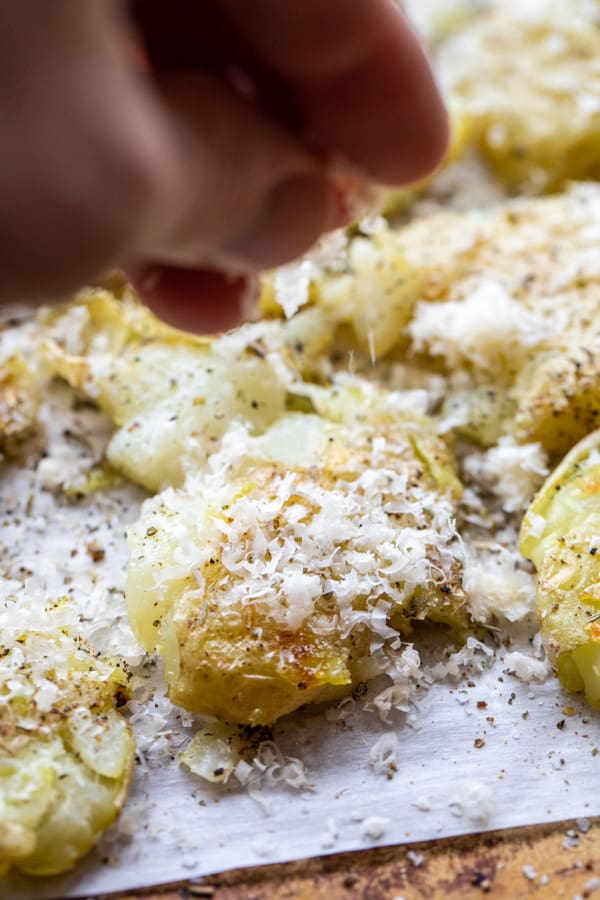 Sprinkle potatoes with parmesan