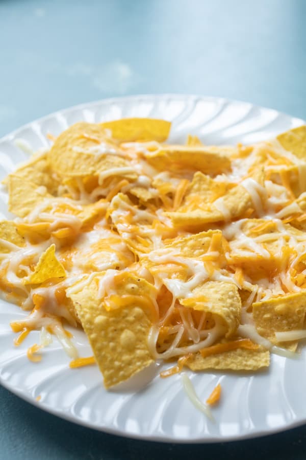 Melted cheese on chips for microwave nachos