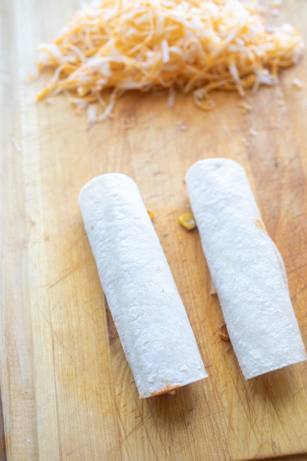 Rolled chicken and cheese enchiladas for two