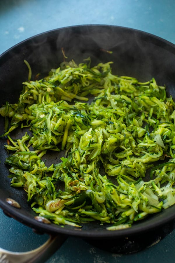 Starting to cook the zucchini for breakfast skillet.