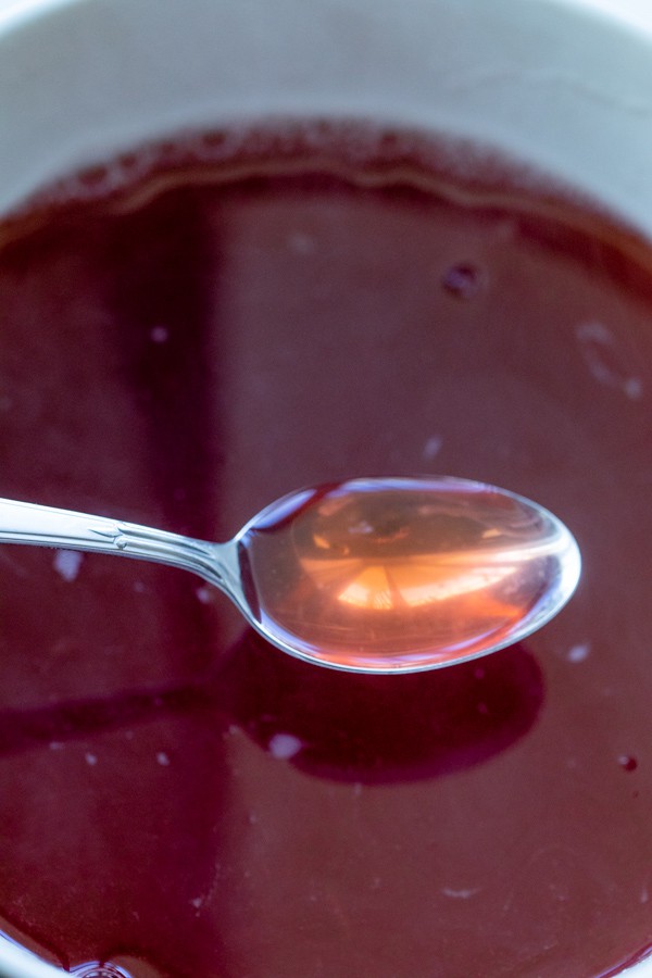 Strained finished strawberry basil syrup for gin cocktials.