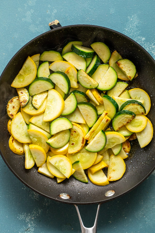 Summer vegatables cooking in butter.