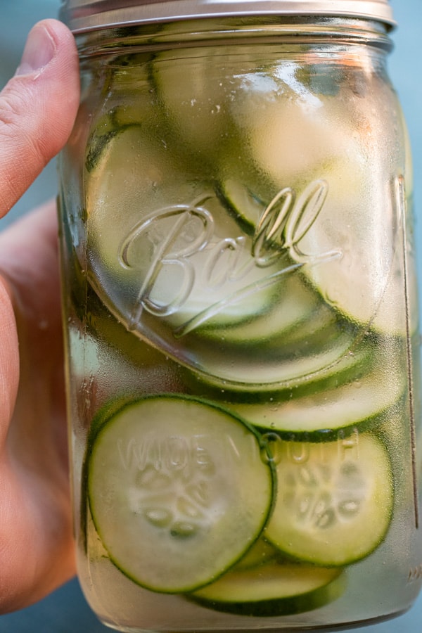 Cucumber with vodka in jar