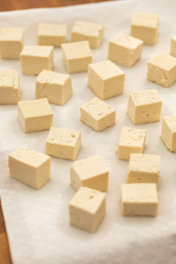 Drying the tofu on paper towels