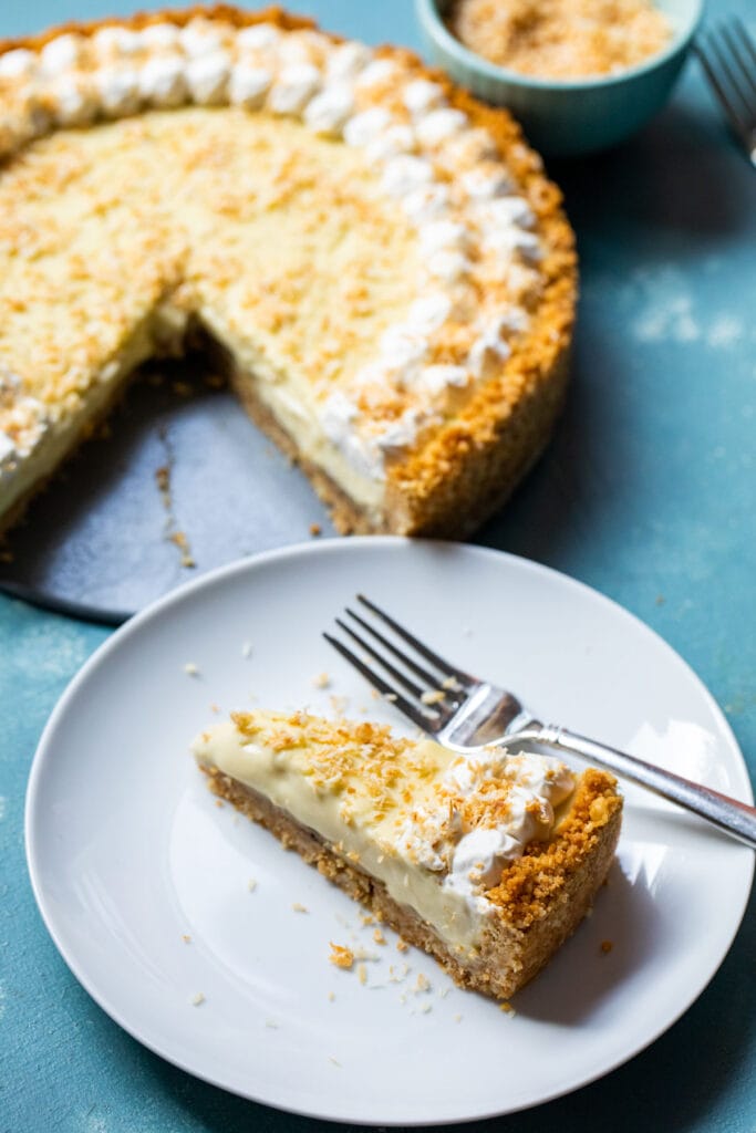 This epic banana coconut cream pie has layers of banana on a cookie crust. The filling is a rich coconut cream pudding and it's topped with toasted coconut! 
