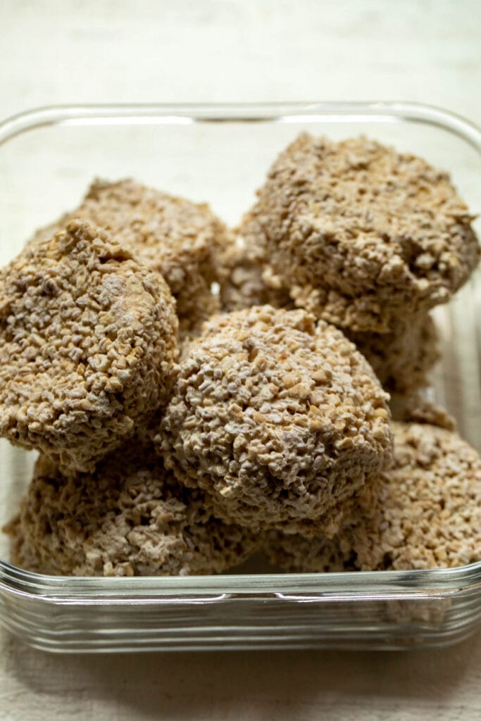 Oatmeal frozen and in container.