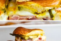 These Baked Cuban Sliders are stuffed with ham, pickles, swiss cheese, and mustard and lightly pressed while they bake. So delicious! #sliders #cuban #Sandwich #appetizer