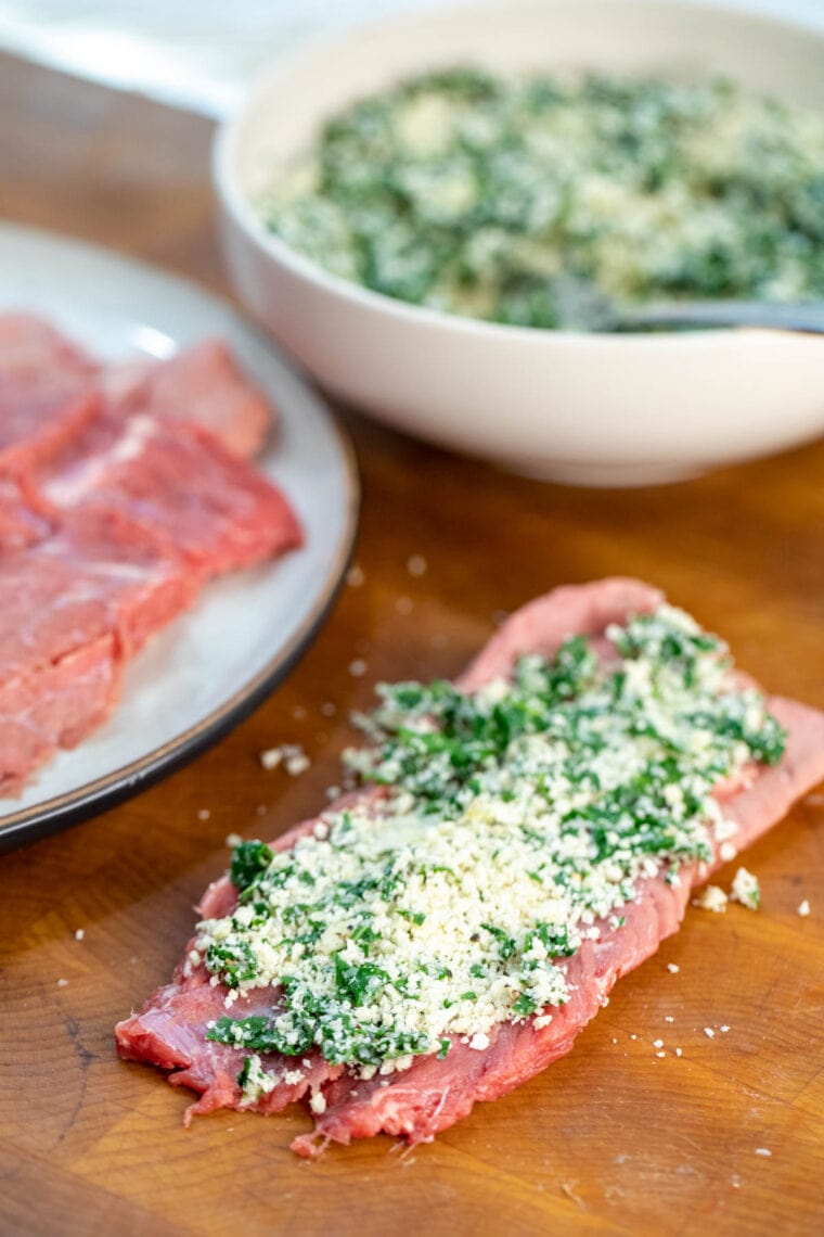 stuffing braciole.