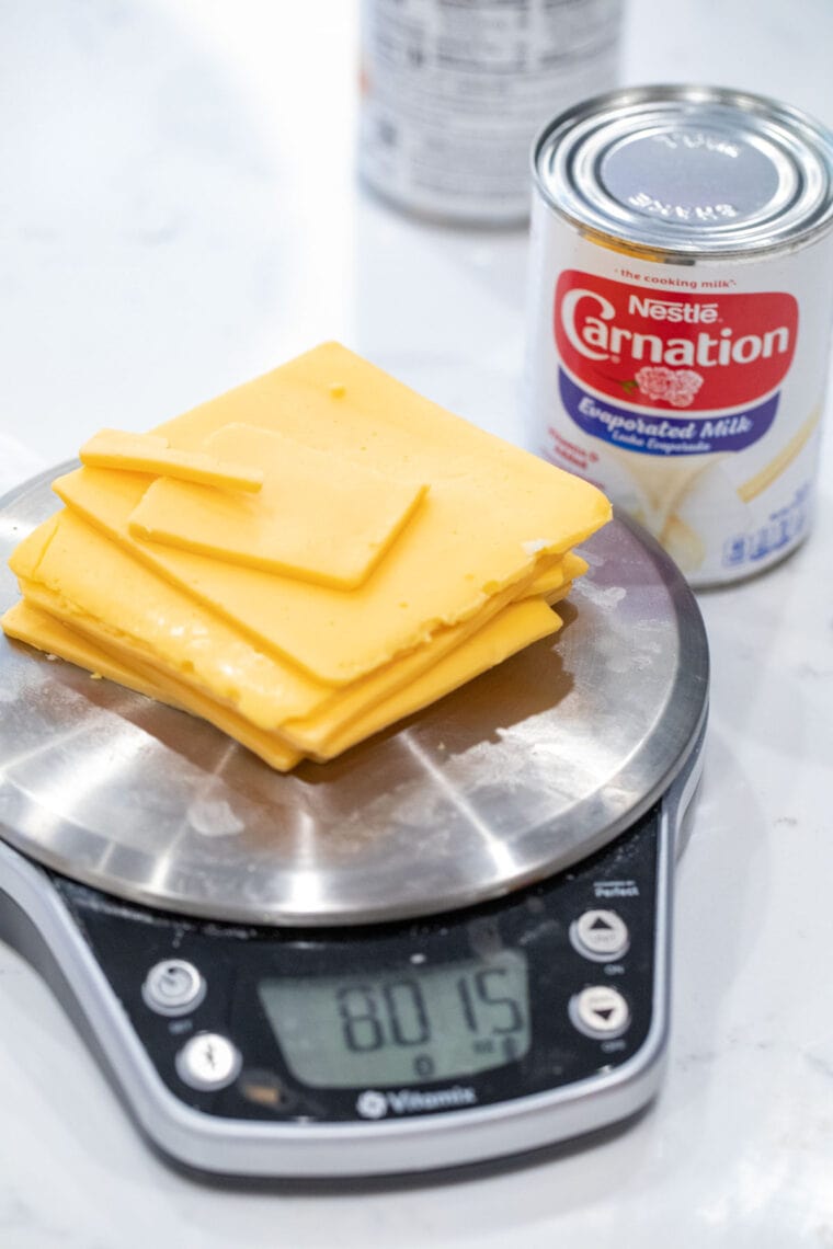 Weighing out cheese for queso.