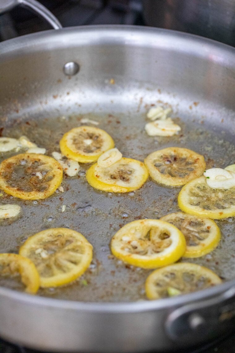 Cooking lemon and garlic.