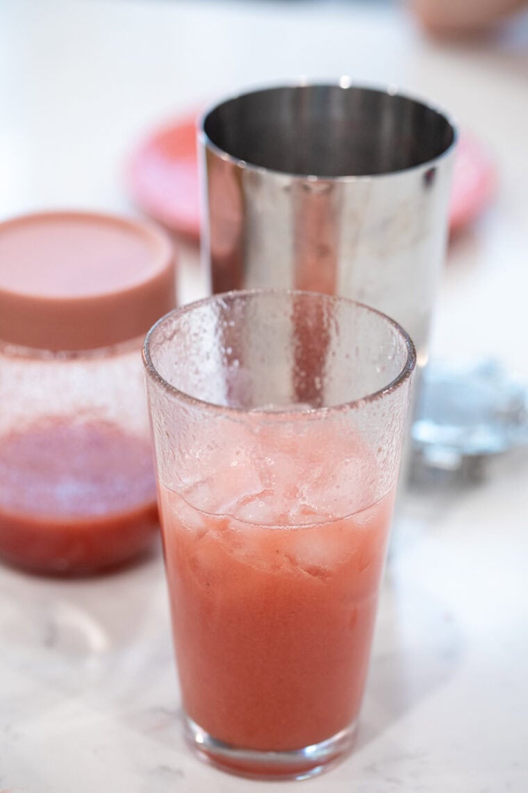 Mixing the cocktail.