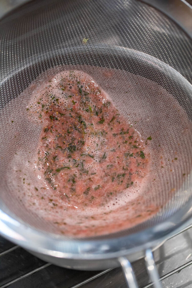 Straining syrup.