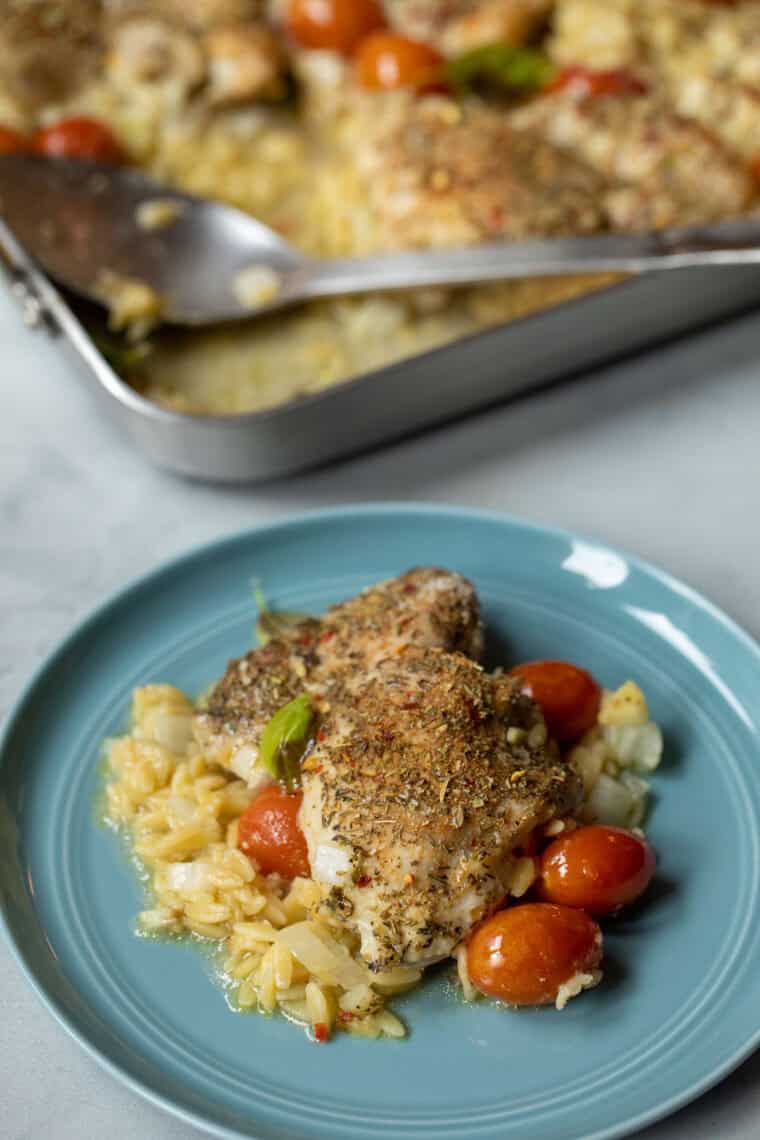 Plated chicken and orzo bake.