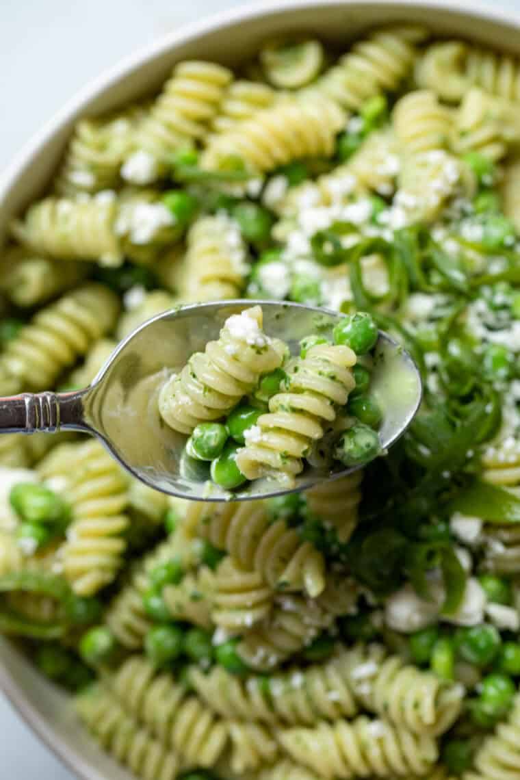 Spoon with pasta salad.