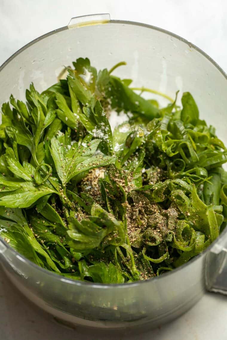 Making green goddess sauce.